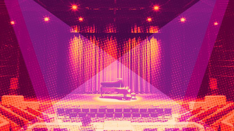 A grand piano on an empty stage with purple and orange overlays.